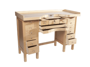 Large GRS jeweler's workbench Key Features: 2-Inch Thick Tabletop: Crafted from natural birch plywood, the substantial thickness provides a robust and stable work surface, especially beneficial for users of the GRS Benchmate or other GRS systems. Ample Storage: With generous storage options, this workbench caters to both beginners and seasoned professionals, ensuring that all your tools and materials are organized and within easy reach. Versatile Use: Suitable for both novice and experienced jewelers, offering a comfortable and functional workspace for various jewelry-making tasks.